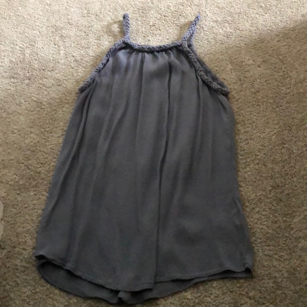Gray/blue top.